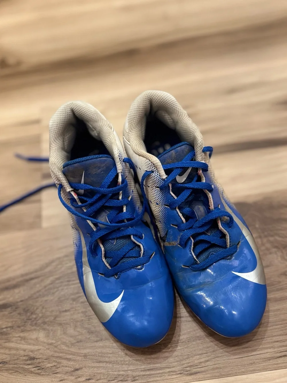 Nike Blue, White, and Black Kids football Cleats size 6